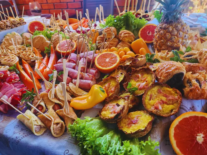 Colourful Deli-icious! harvest table in Bloemfontein with quiches, wraps, cold meats and fresh fruit